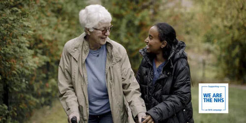 woman carer with old man