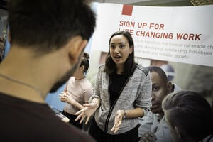 A person presenting at a careers fair - copyright Alex Holland/University of York